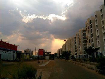 View of city against cloudy sky