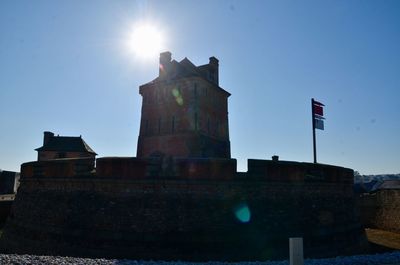 Low angle view of old building against clear sky