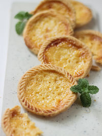 Cake of pie. custard tarts or pie susu on marble board . selective focus