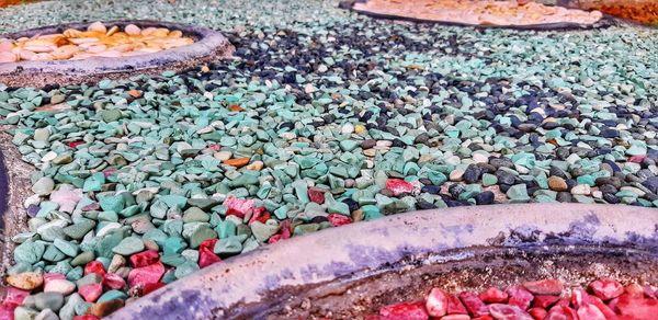 Close-up of multi colored stones on pebbles