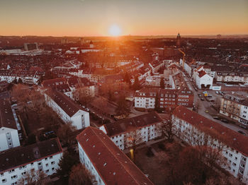 High angle view of townscape against sky during sunset