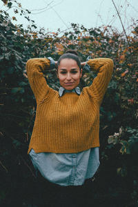 Woman standing in park during winter