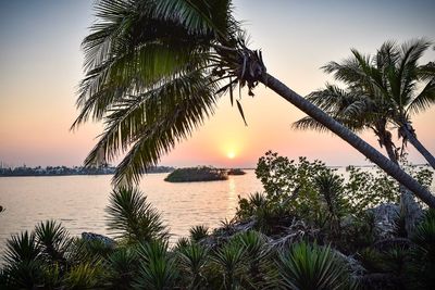Scenic view of sea against sky at sunset
