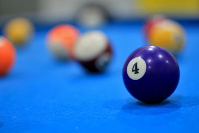 Close-up of blue balls on table