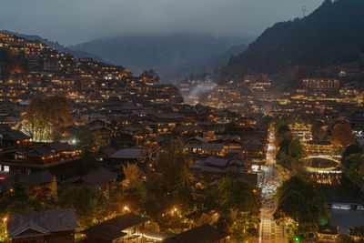 High angle view of townscape against sky at night