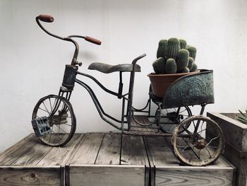 Bicycle on wooden wall