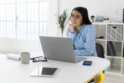 Man using laptop on table