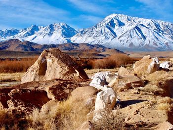 Scenic view of snowcapped mountains against sky