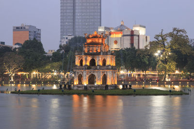 Turtle tower on hoan kiem lake at dusk