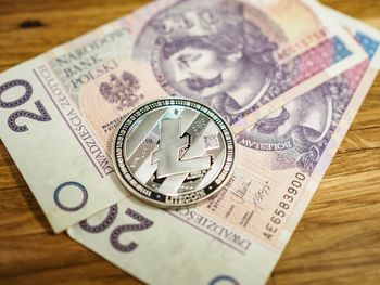 High angle view of currency on table