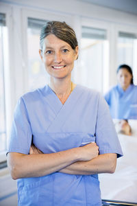 Portrait of smiling doctor in hospital