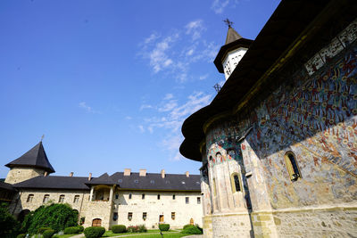 Low angle view of old building against sky