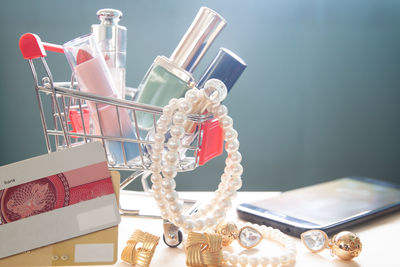 Close-up of personal accessories on table