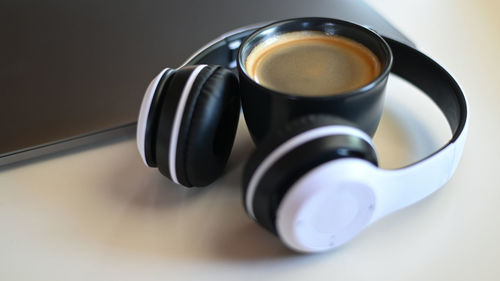 High angle view of coffee cup on table