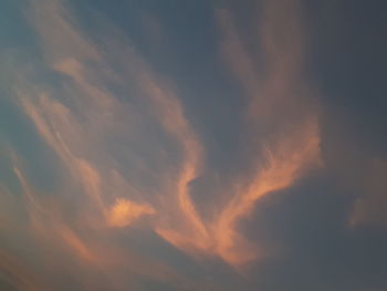 Low angle view of dramatic sky during sunset