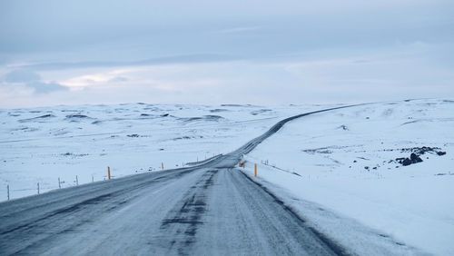 Road against sky during winter