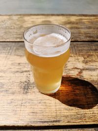 High angle view of beer glass on table