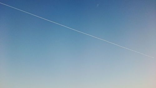 Low angle view of vapor trail in sky