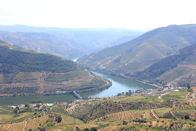 High angle view of farms against sky