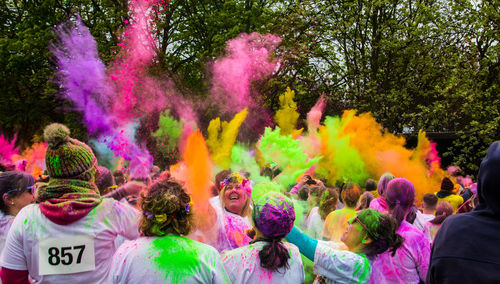 Group of people on multi colored flowers