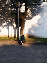 Low section of man against trees