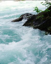 Waves splashing on rocks