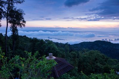 Scenic view of mountains against sky at sunset