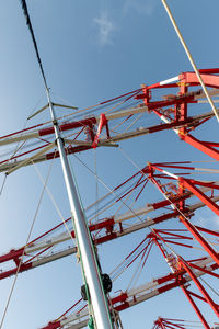 Low angle view of ferris wheel against sky