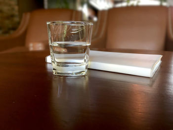 Close-up of empty glass on table