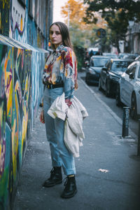 Full length of woman standing on street