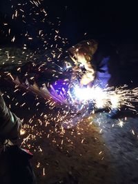 Person with fireworks at night