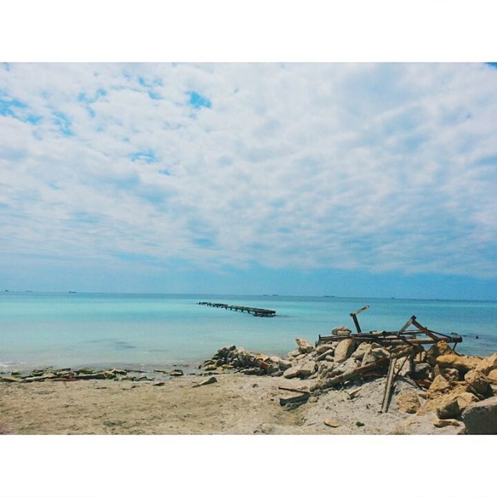 sea, water, horizon over water, sky, beach, cloud - sky, tranquility, tranquil scene, scenics, shore, transfer print, nautical vessel, auto post production filter, nature, beauty in nature, cloudy, cloud, pier, boat, transportation