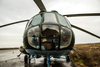 Low angle view of airplane on field