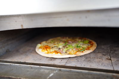 High angle view of pizza on table