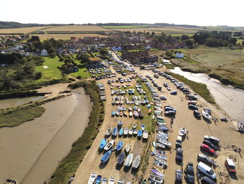 Boats on the land at brancaster harbour 