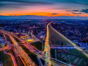 High angle view of traffic on road at sunset