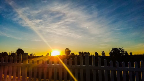 View of cemetery against sky during sunset