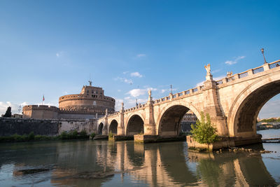 Arch bridge over river