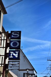 Low angle view of clock tower against sky
