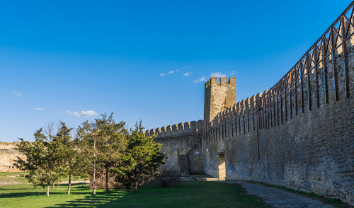 View of historic building against blue sky