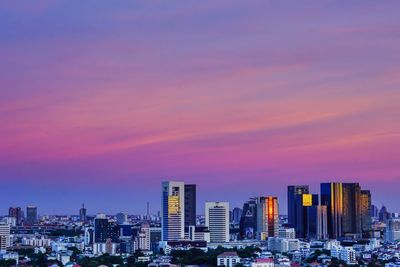 Cityscape against sky during sunset