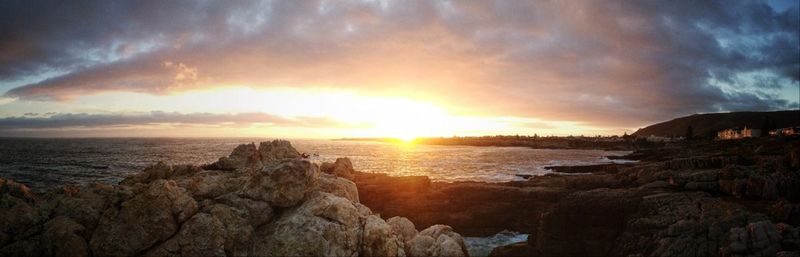 Scenic view of sea at sunset