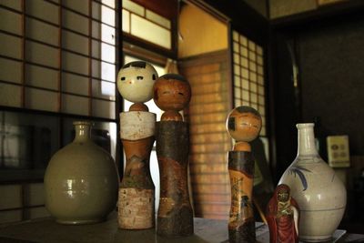 Close-up of bottles on shelf