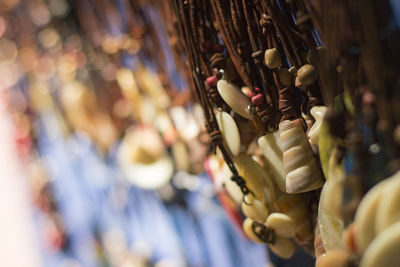 Close-up of decorations hanging in store