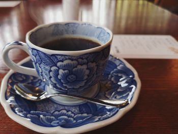 Close-up of tea cup on table