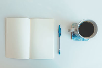 Close-up of coffee cup on white background