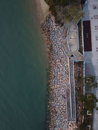High angle view of swimming pool by building