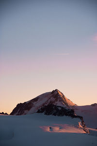 Scenic view of mountains against clear sky