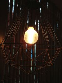 Low angle view of illuminated pendant light