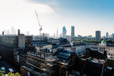 Modern buildings in city against sky